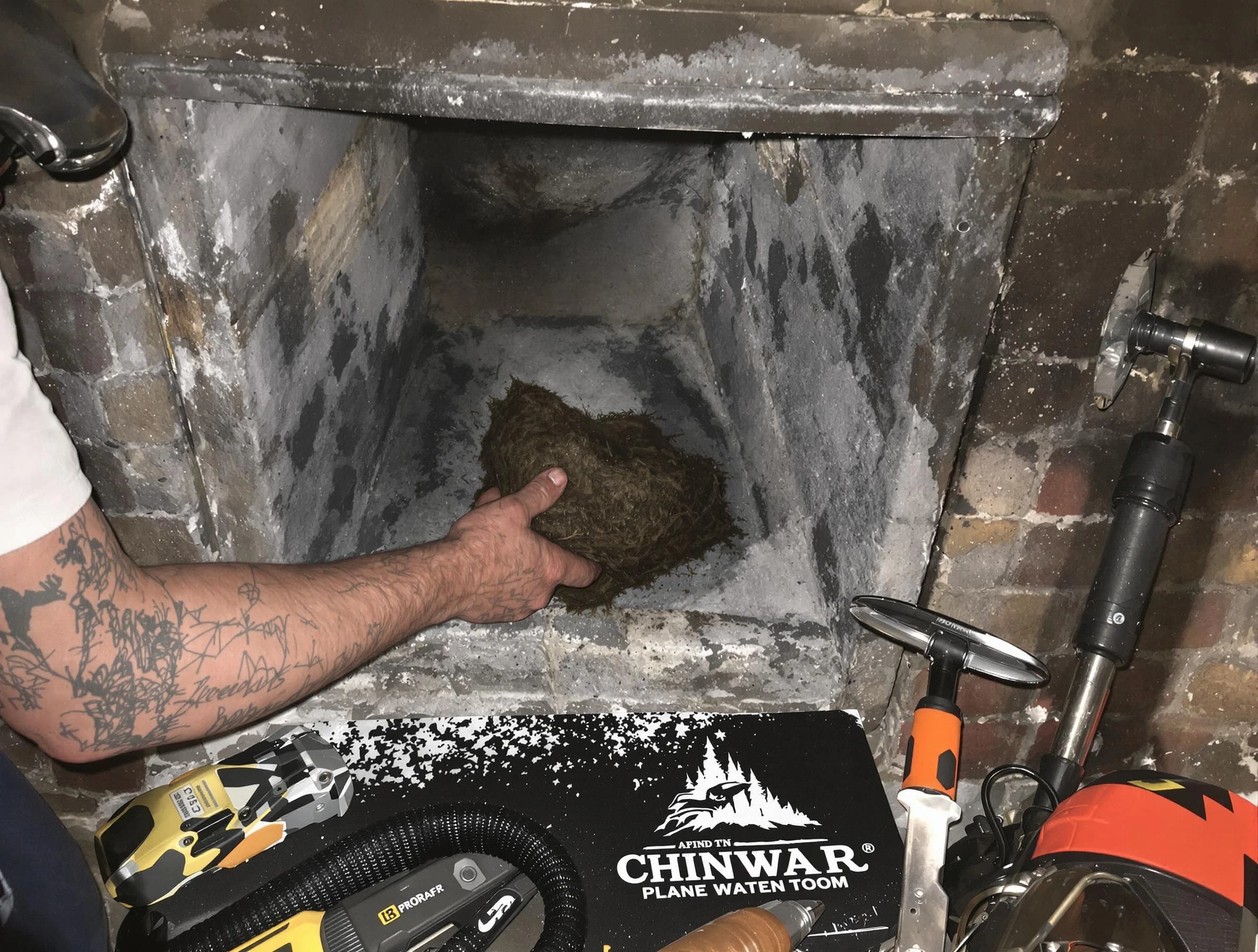 Chelsea Chimney Sweep safely removing debris and screening chimney in Chelsea, AL